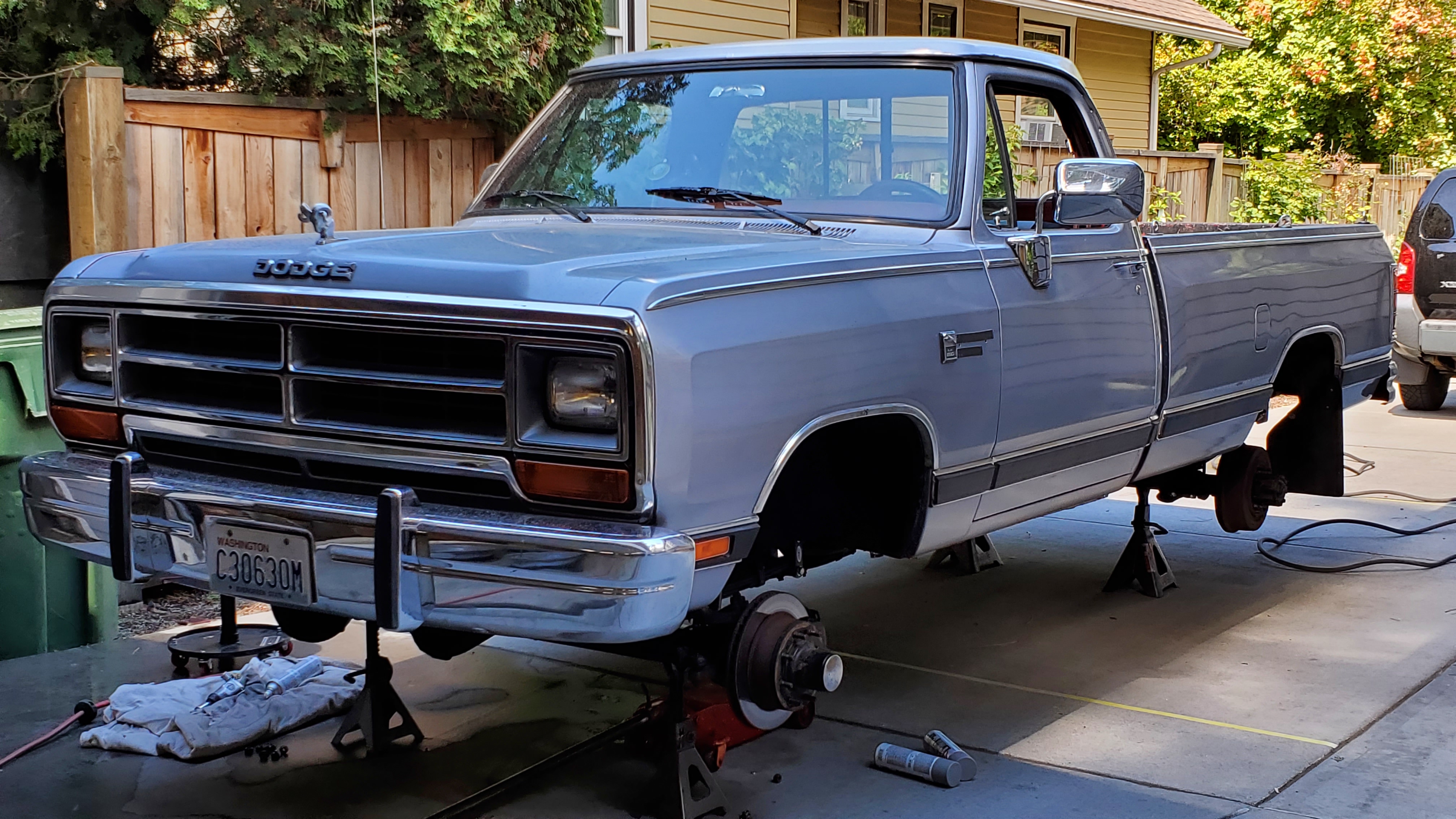 Truck on jack stands, no tires